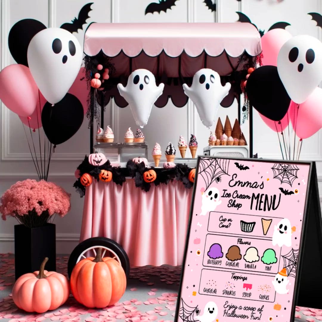 This may contain: a table topped with lots of balloons and halloween themed items next to a menu board