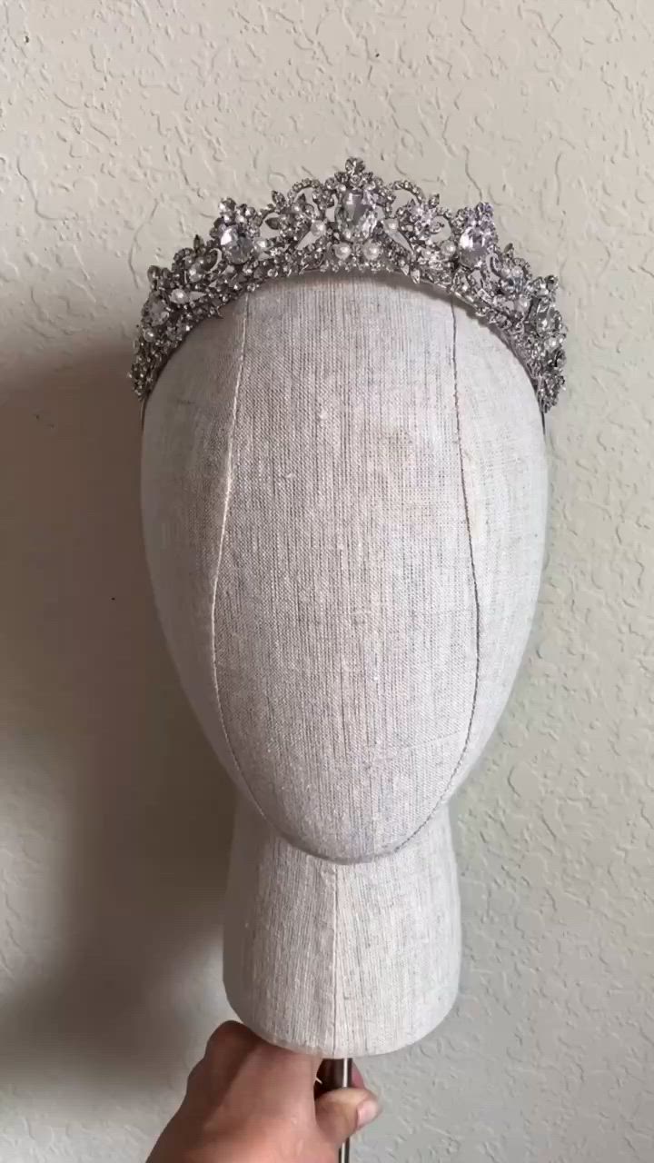 Get prepared to fall in love with this delicate pearl & Swarovski bridal tiara! | wedding inspo, 2024 wedding, 2024 bride, wedding hair, bridal hair styles, bridal hair accessories, bridal headpieces, headpieces for brides, bridal tiara, bridal crown, tiaras and crowns, headpieces for brides, luxury jewelry, diamond crown, bridal hair ideas, sparkly tiaras, sparkly wedding tiara, diamond tiara,glamorous wedding, Swarovski jewelry, Swarovski accessories #bridetobe #wedding #weddinghair