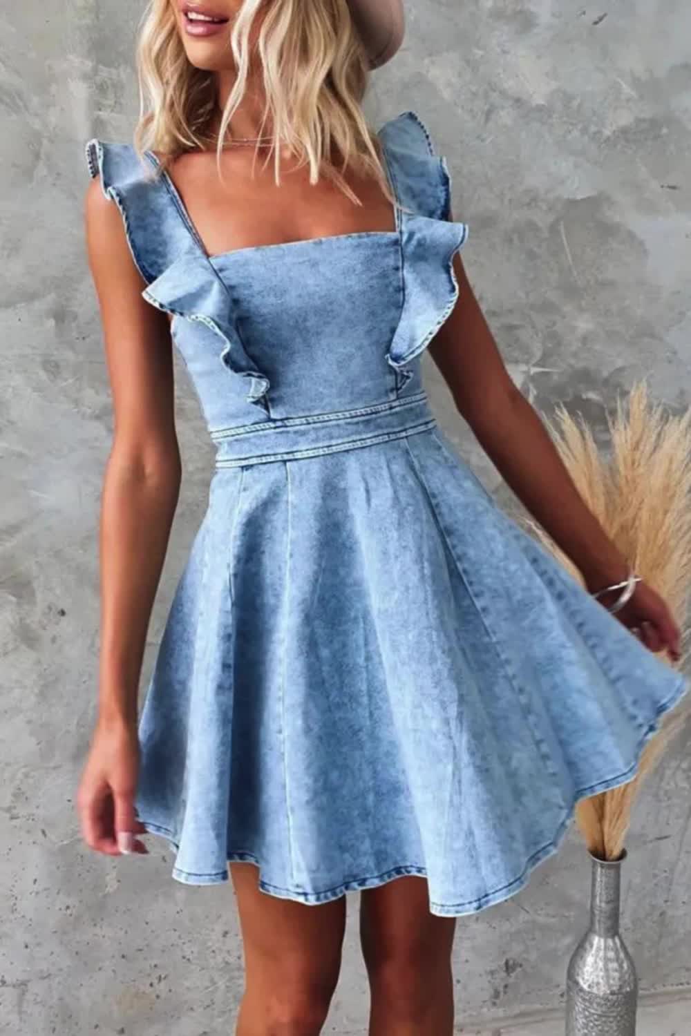 This flounce denim dress exudes sweet elegance with a touch of vintage charm. Its old-world flair is complemented by delicate flounces, adding a romantic allure. Crafted from denim, it merges timeless style with modern sophistication, promising a captivating look for any occasion.