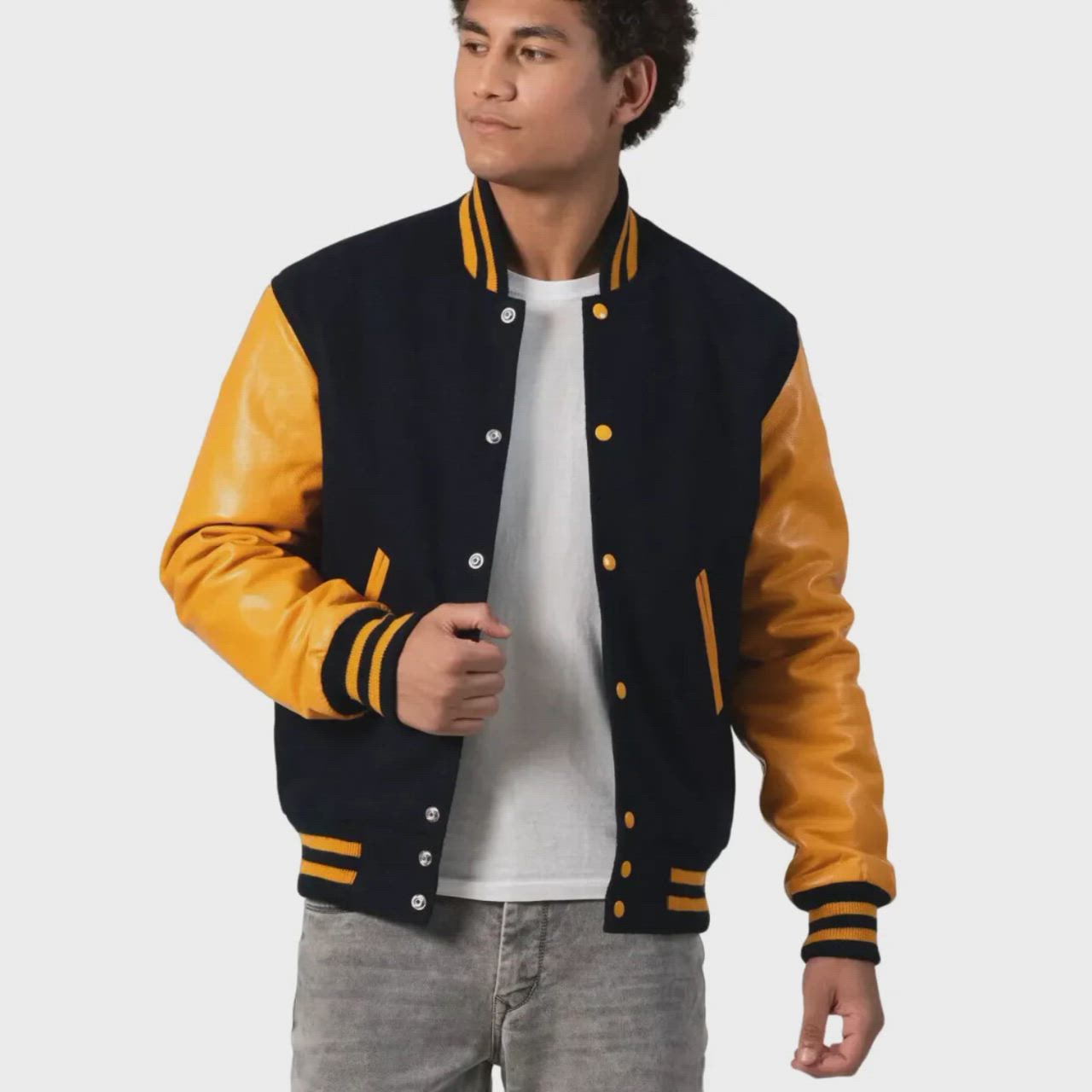 This contains: Mens Black And Yellow Leather Varsity Jacket