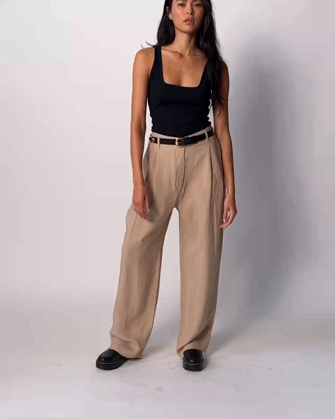 It's here. (Finally.) Inspired by the vintage trousers of your dreams, this is a wide leg cut with perfectly undone front pleats, a streamlined hook and bar closure, and an ultra-relaxed fit for a subtle off-duty vibe during your on-duty days. Pairs well with the Beau Blazer. (This one comes in Paper Bag.) | Del Trouser in Paper Bag | Ethical Essentials