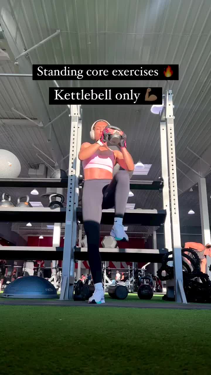 This may contain: a woman is doing squats on a pull up bar in a gym with the words standing core exercises kettlebell only