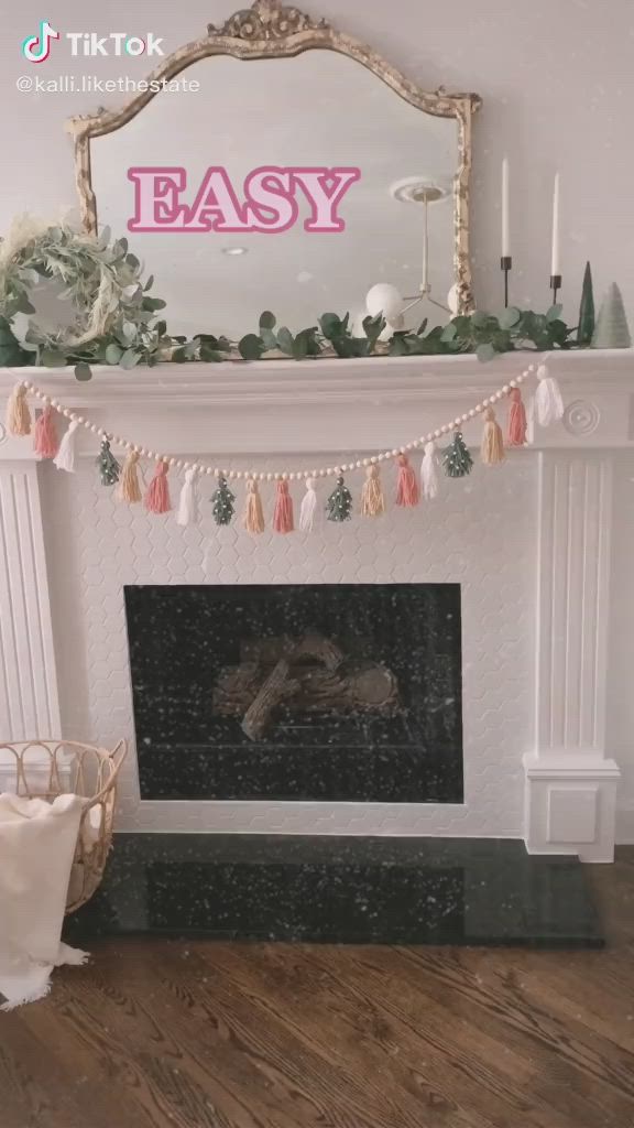 This may contain: several tassel garlands hanging on a wall with the words easy diy holiday tassel garland