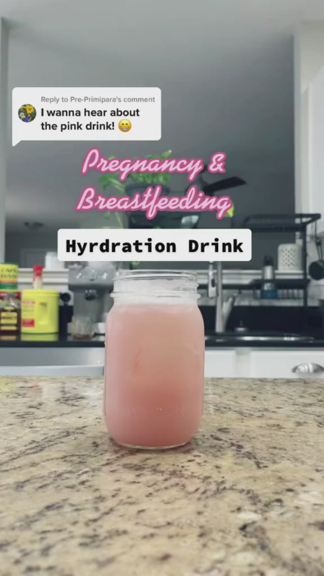 This may contain: a pink drink sitting on top of a counter next to a bottle of liquid with the caption, pregnant and breastfeeding hydration drink