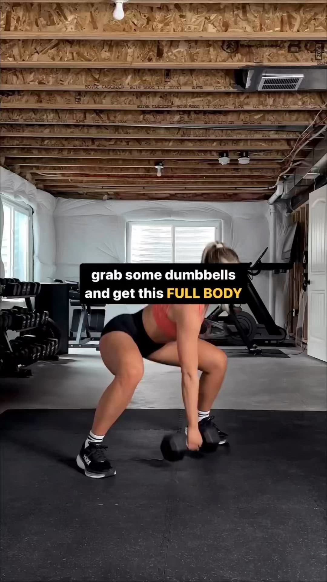 This may contain: a woman doing squats with dumbbells and get this full body