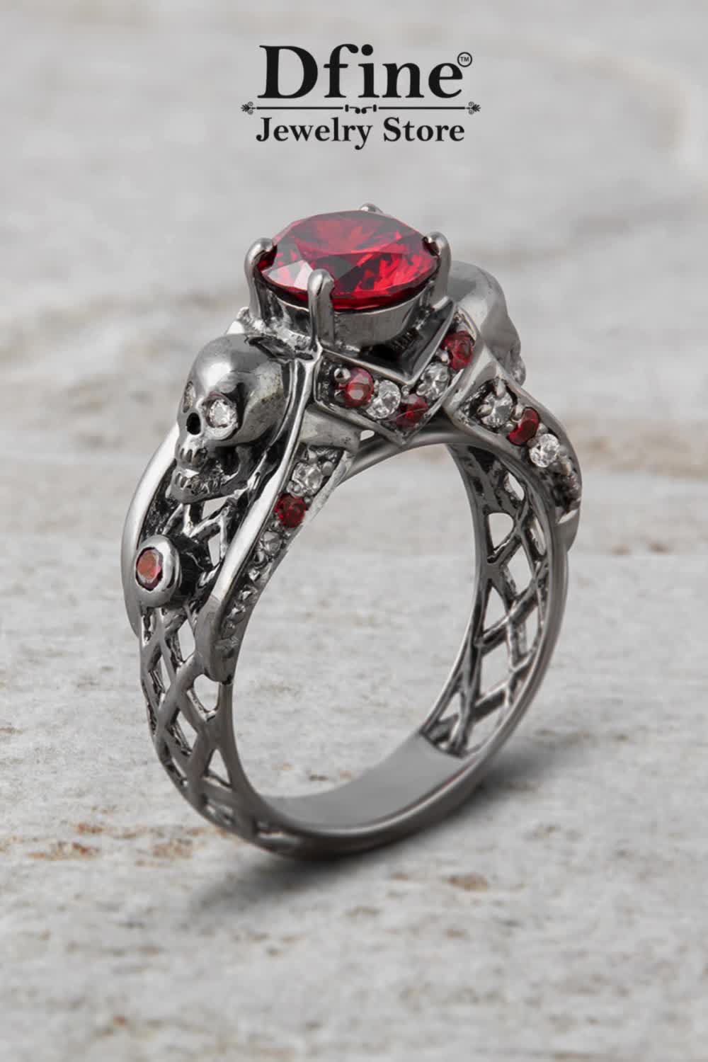 This contains: Skull Ring, Skull Engagement Ring, Skull Wedding Ring, Gothic Jewelry, Red Garnet Gemstone, Criss Cross skull Ring, Memento Mori Skull Ring, Anniversary Gift for Her, 925 Sterling silver, Gun Metal