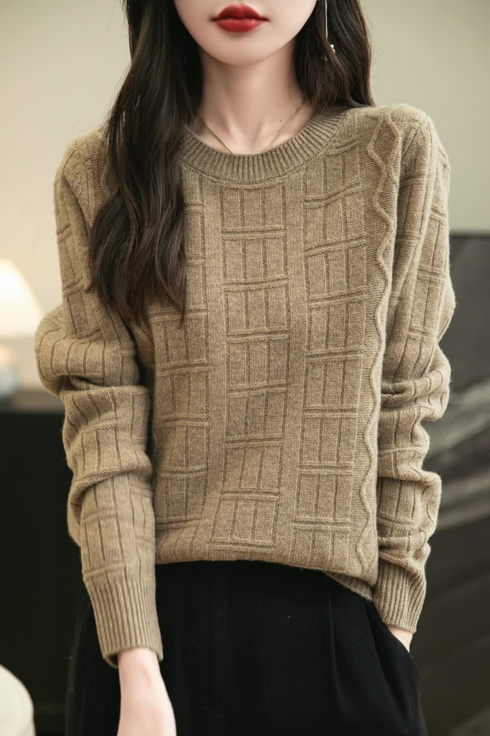 This contains: This women's sweater is made of 100% Merino wool, providing warmth and comfort during the fall and winter seasons. Its solid color and knitted design add a touch of elegance to any outfit. Stay cozy and stylish with this must-have addition to your wardrobe.