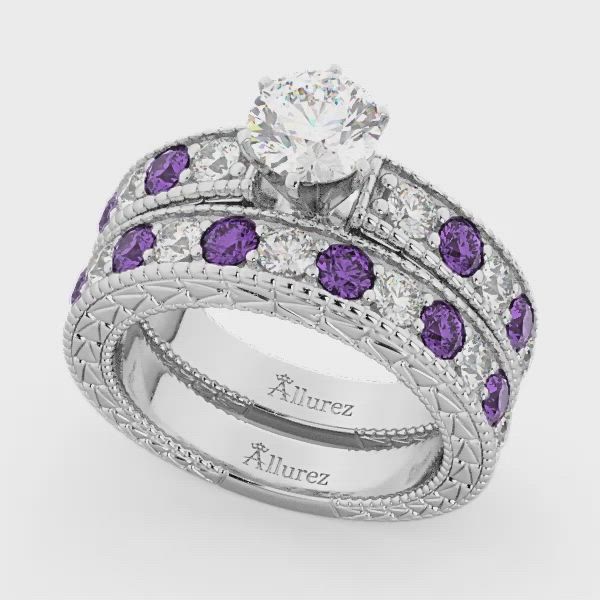 A total of 10 colored gemstones alternate with 13 brilliant-cut round sparkling diamonds to form this wonderful vintage style amethyst and diamond engagement ring with wedding band. The diamond and amethyst engagement ring set showcases a total of 1.80 carats. The antique scroll work and the milgrain edges add the ultimate designer's touch to these 14 karat White Gold genuine colored gemstone bridal ring set.