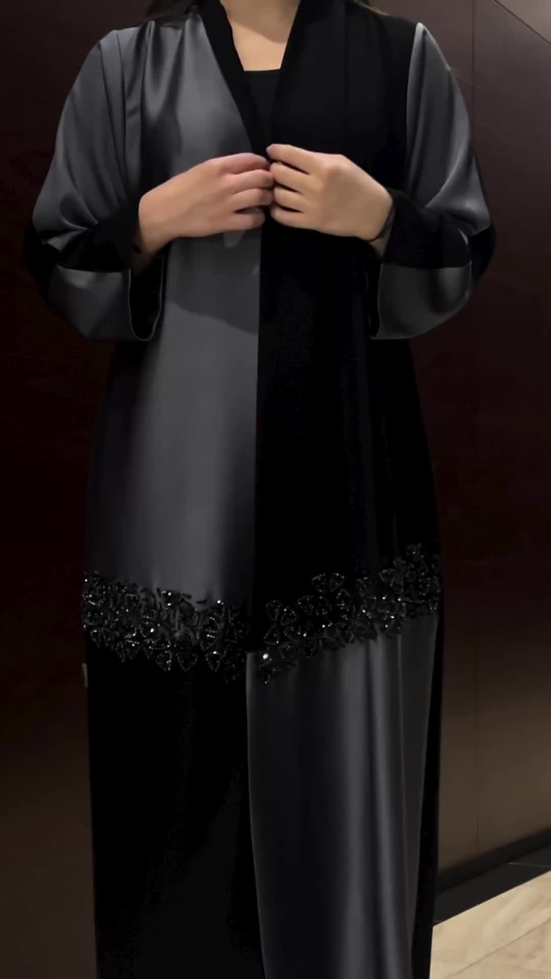 This contains an image of: Manufacturer original dubai imported Abaya world wide supply wholesale +923356925378 more details Wh