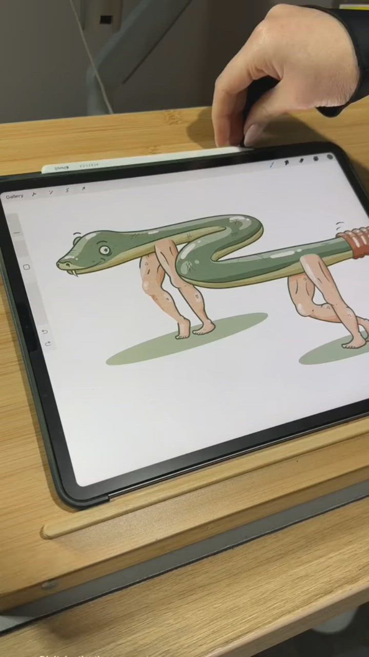 This may contain: a person holding an ipad with a green snake on it's screen and another hand reaching for the tablet