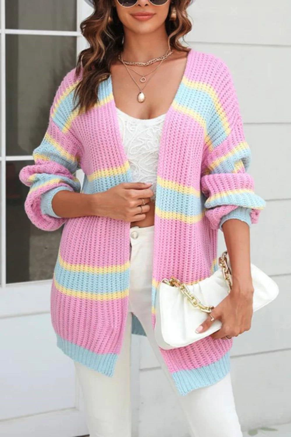 Elevate your style with our Multicolor Panel Long Cardigan Sweater. The unique design features vibrant panels that add a playful touch to this long and cozy cardigan. Perfect for chilly days, it offers both warmth and a fashionable statement. The open front and relaxed fit make it easy to layer over any outfit. Embrace the blend of comfort and chic style with this eye-catching multicolor cardigan, a must-have for your wardrobe.