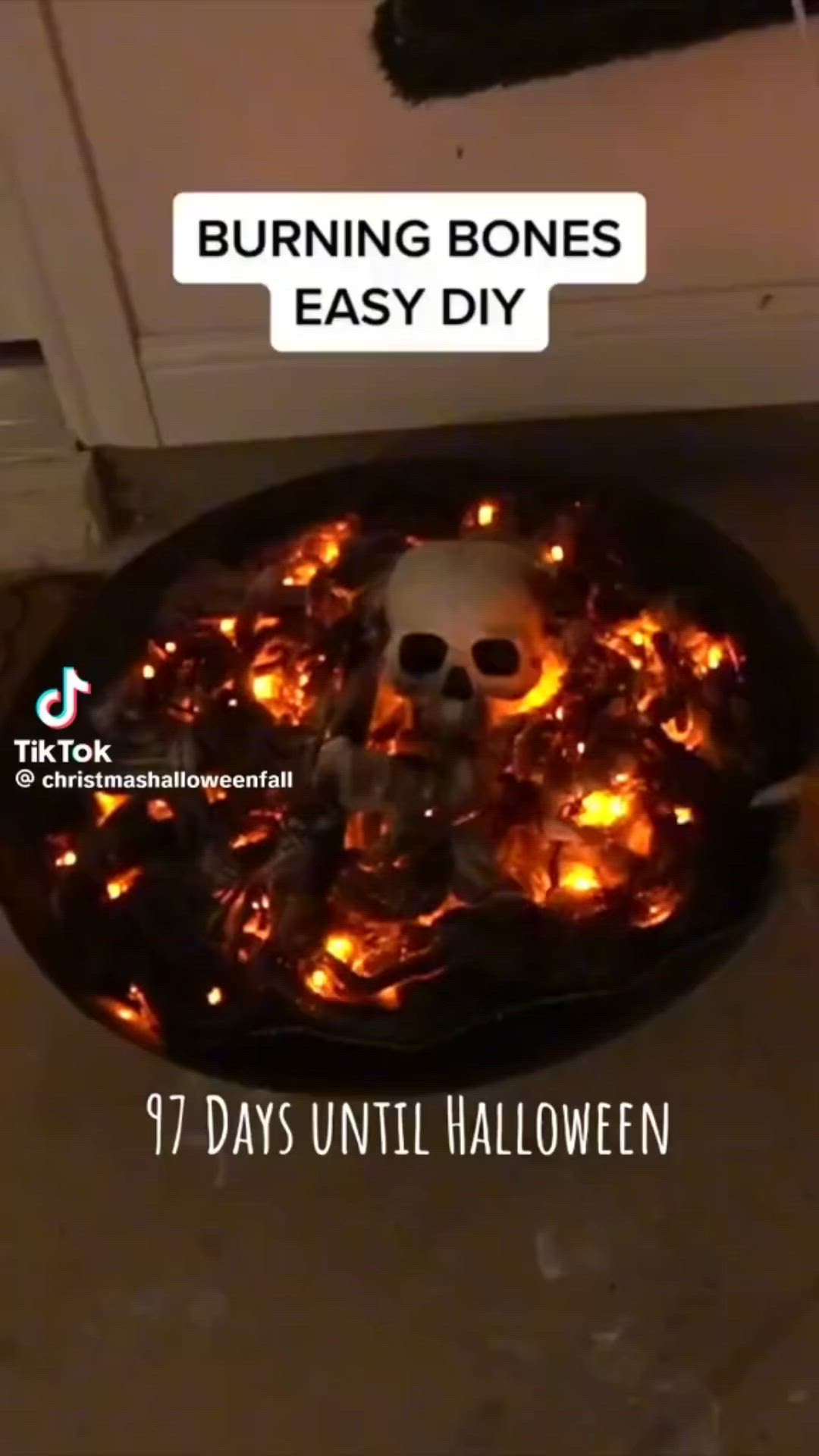 This may contain: a fire pit with burning bones on it and the words, 7 days until halloween