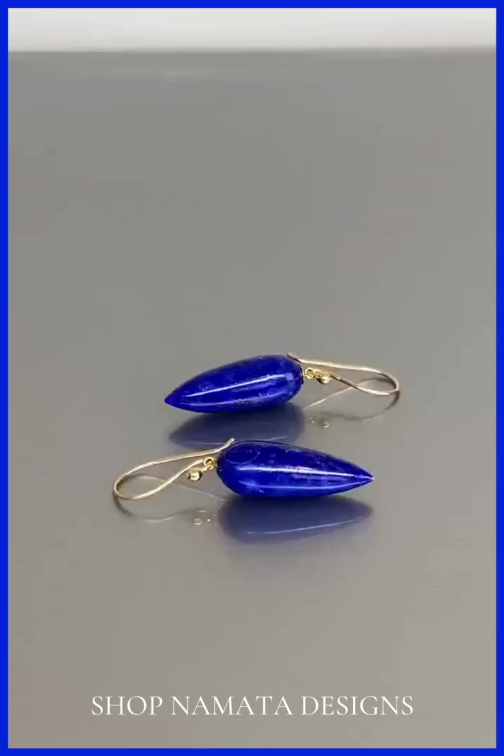 This contains: Lapis lazuli jewelry, 14K gold earrings