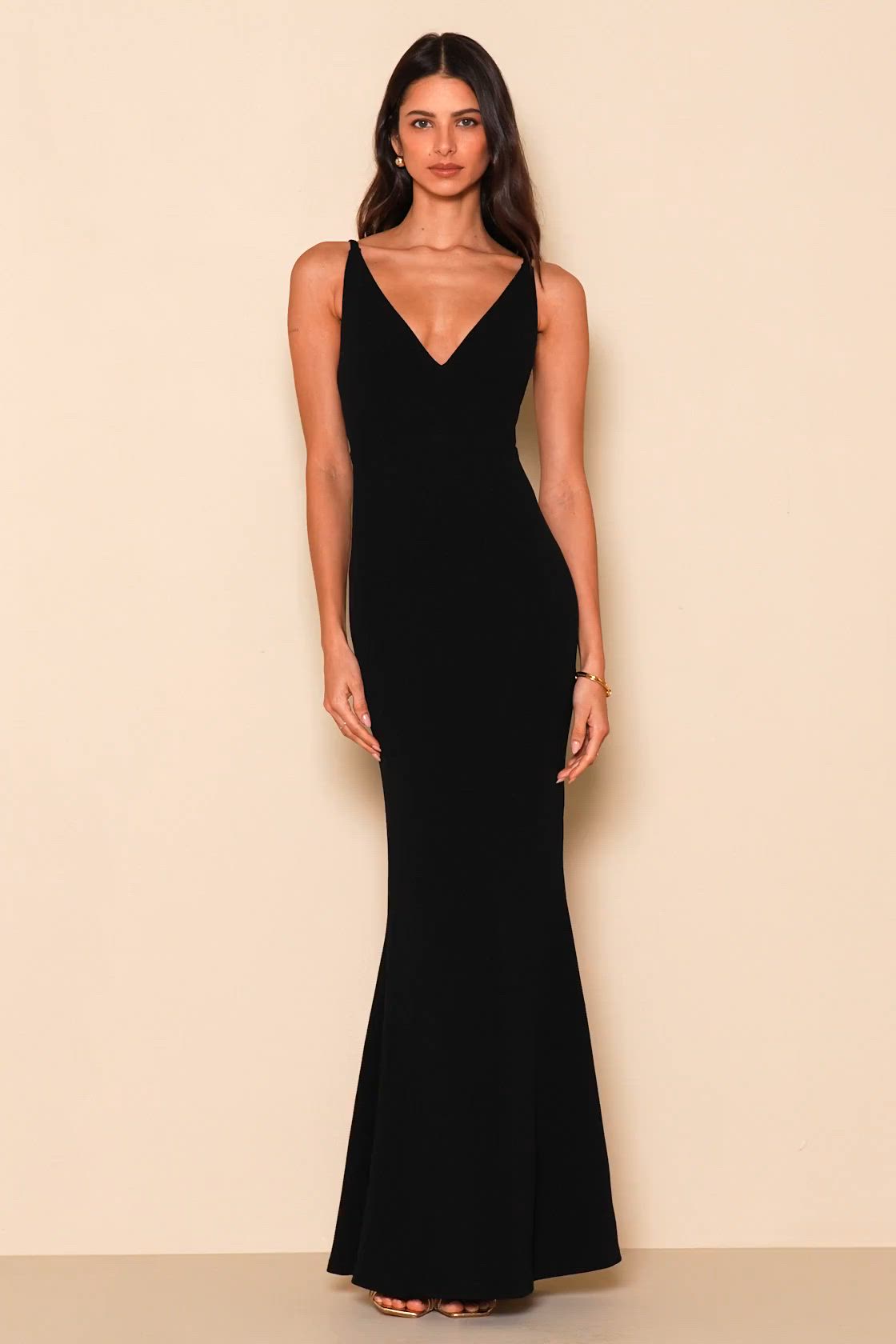 Enchantress will be your middle name when you step out in the Lulus Melora Black Sleeveless Maxi Dress! Medium-weight, stretch crepe knit falls effortlessly from tapering straps, to a darted bodice with V-neck and back. Fitted waist meets the full-length maxi skirt with a flaring mermaid hem. Hidden back zipper/clasp. Fit: This garment fits true to size. Length: Floor length. Size medium measures 60.5" from shoulder to hem. Bust: Great for any cup size. Waist: Fitted - stretchy fabric allows cus