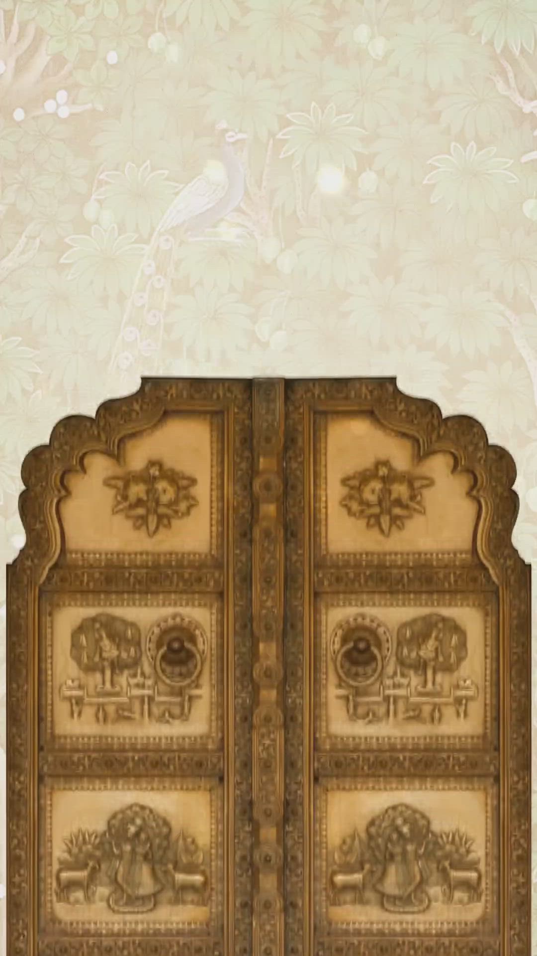 This may contain: an ornately decorated wooden door in front of a floral wallpapered background with white flowers