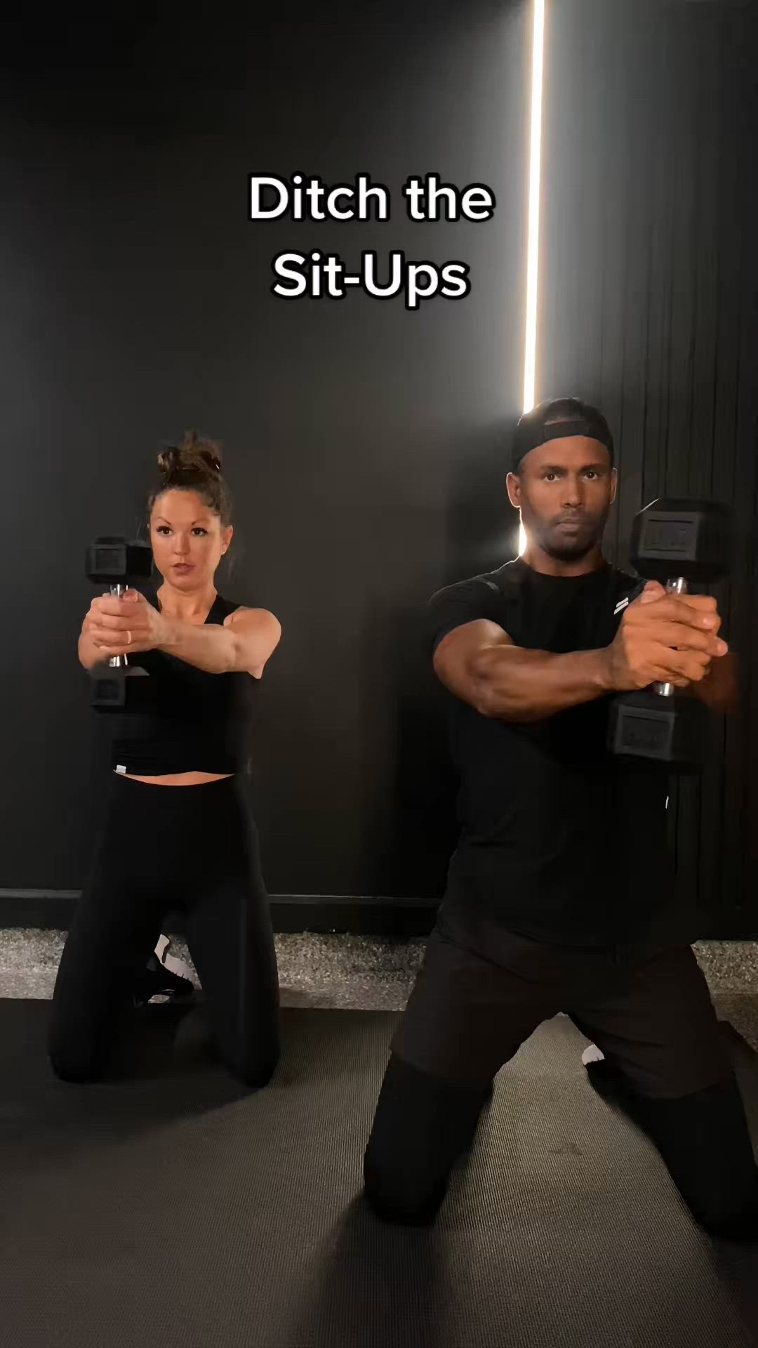 This may contain: a man and woman are doing squats in front of a wall with the words ditch the sit - ups on it