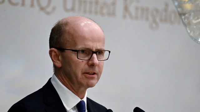 Sir Jeremy Fleming delivering an address in Singapore in 2019