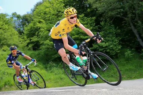 Allsport Chris Froome riding a Pinarello bike during a Tour de France stage