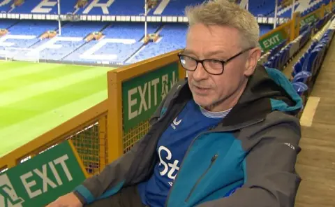 Tony Snell sits inside Goodison stadium