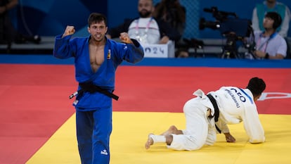 El judoca Francisco Garrigós, tras ganar la medalla de bronce en judo masculino contra el georgiano Guiorgui Sardalashvili.