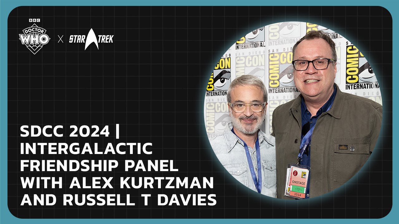 Alex Kurtzman and Russell T Davies pose in front of a San Diego Comic-Con step and repeat