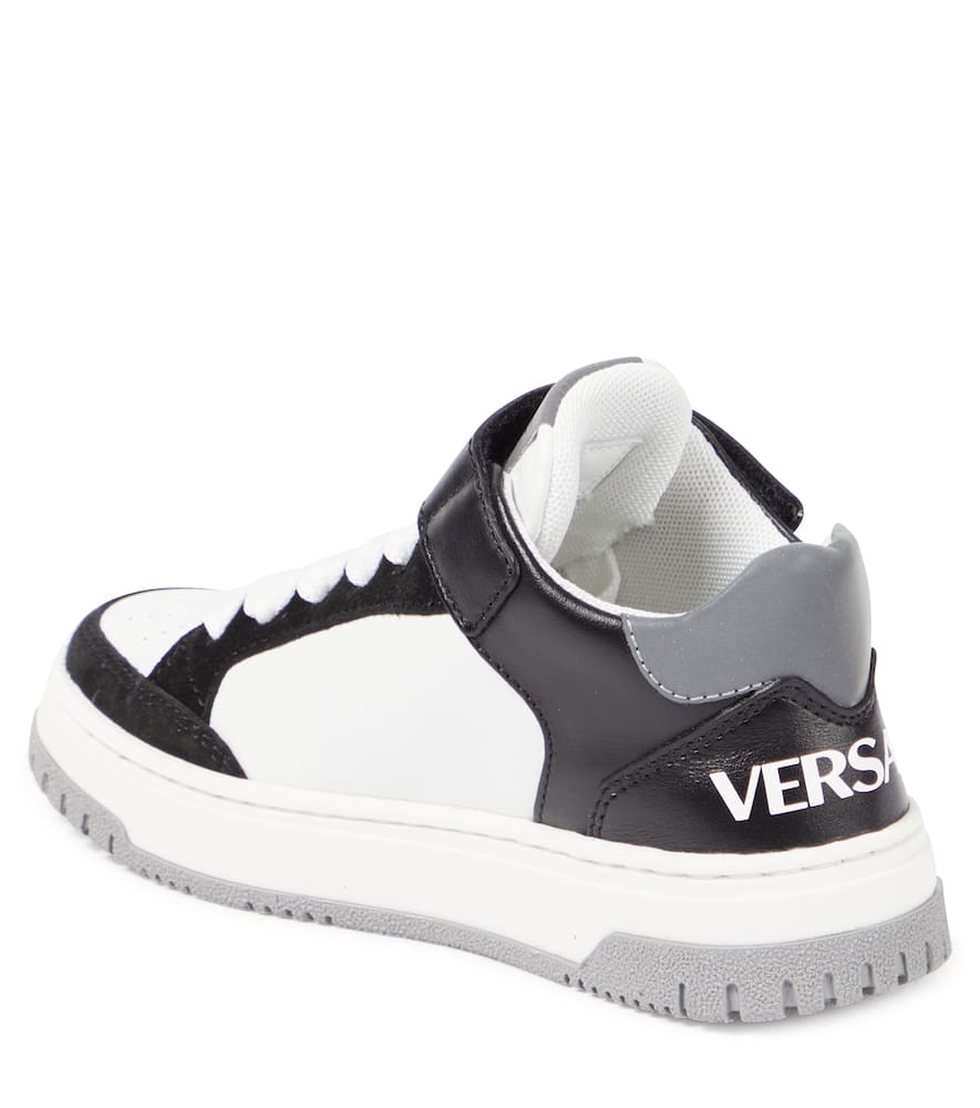 Shop Versace Logo Leather Sneakers In White