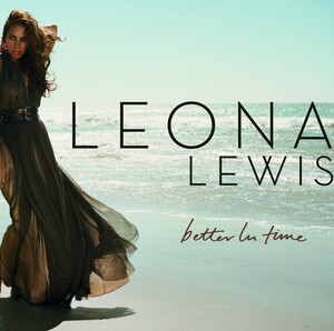 A brunette woman is standing in front of a beach. She is wearing a greenish dress and she grabs her neck with her left arm. Next to her image, the words "Leona Lewis" are written in black capital letters, and "Better In Time" in dark brown italics.