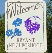 These signs, designed by Judy Anderson, welcome visitors to Bryant Neighborhood