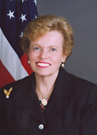 official Department of State photo of Ellen Sauerbrey, seated in front of a U.S. flag