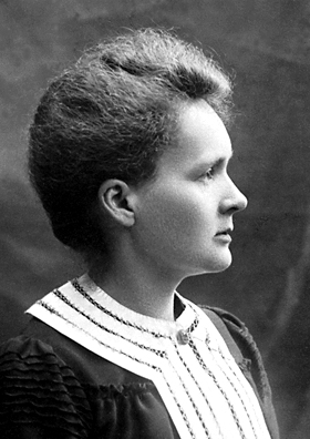 A black and white portrait of a woman in profile.