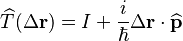 \widehat{T}(\Delta\mathbf{r}) = I + \frac{i}{\hbar}\Delta\mathbf{r} \cdot \widehat{\mathbf{p}}