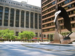 The century-old, neoclassical County and City Hall building (left) in the Chicago Loop houses the County Board chambers and administrative offices