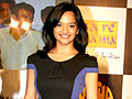 Smiling young woman with shoulder-length, black hair