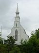 Front facade with spire of Holy Trinity