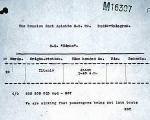 Image of a distress signal reading: "SOS SOS CQD CQD. MGY [Titanic]. We are sinking fast passengers being put into boats. MGY"