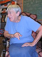 Le Guin answering questions in 2004.