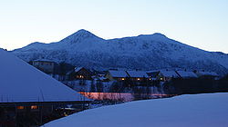 View of Leknes in winter (Bulitinden and Guratinden mountains in background)