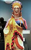 Color reconstruction of statue of a young girl from the Parthenon in Athens, 520 BC. Based on analysis of trace pigments.