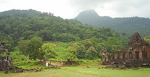 Vat Phou: from left, the south palace, the tiers leading to the central sanctuary, the mountain peak shrouded in mist, and the north palace.