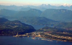 Powell River Mill and townsite area of Powell River. The river itself runs from Powell Lake (background) to the mill.