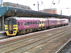 Class 158ain Northern Spirit - TransPennine Express liveryt Doncaster station in July 2003