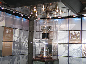 Trophy bowl and base in glass case