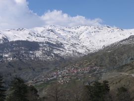 View on Aetomilitsa village, Ioannina prefecture, Greece. Peaks of Grammos mountain visible in the background