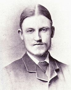 young man with faint, wispy beard