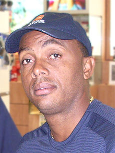 A man in a blue cap