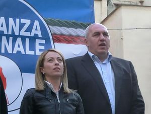 Giorgia Meloni with Guido Crosetto at a FdI rally in 2014