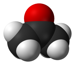 A ball structure of a molecule. Its backbone is a zig-zag chain of three carbon atoms connected in the center to an oxygen atom and on the end to 6 hydrogens.