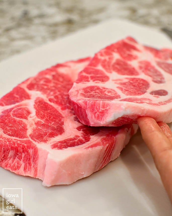 sliced pork shoulder on a cutting board