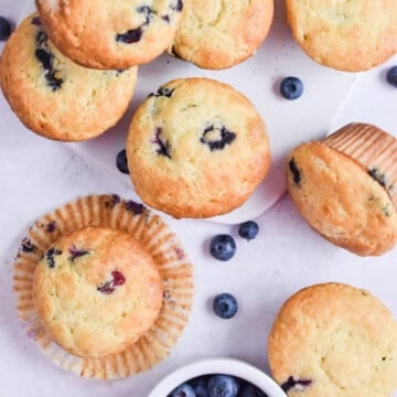 An overhead shot of the blueberry muffins with sour cream.