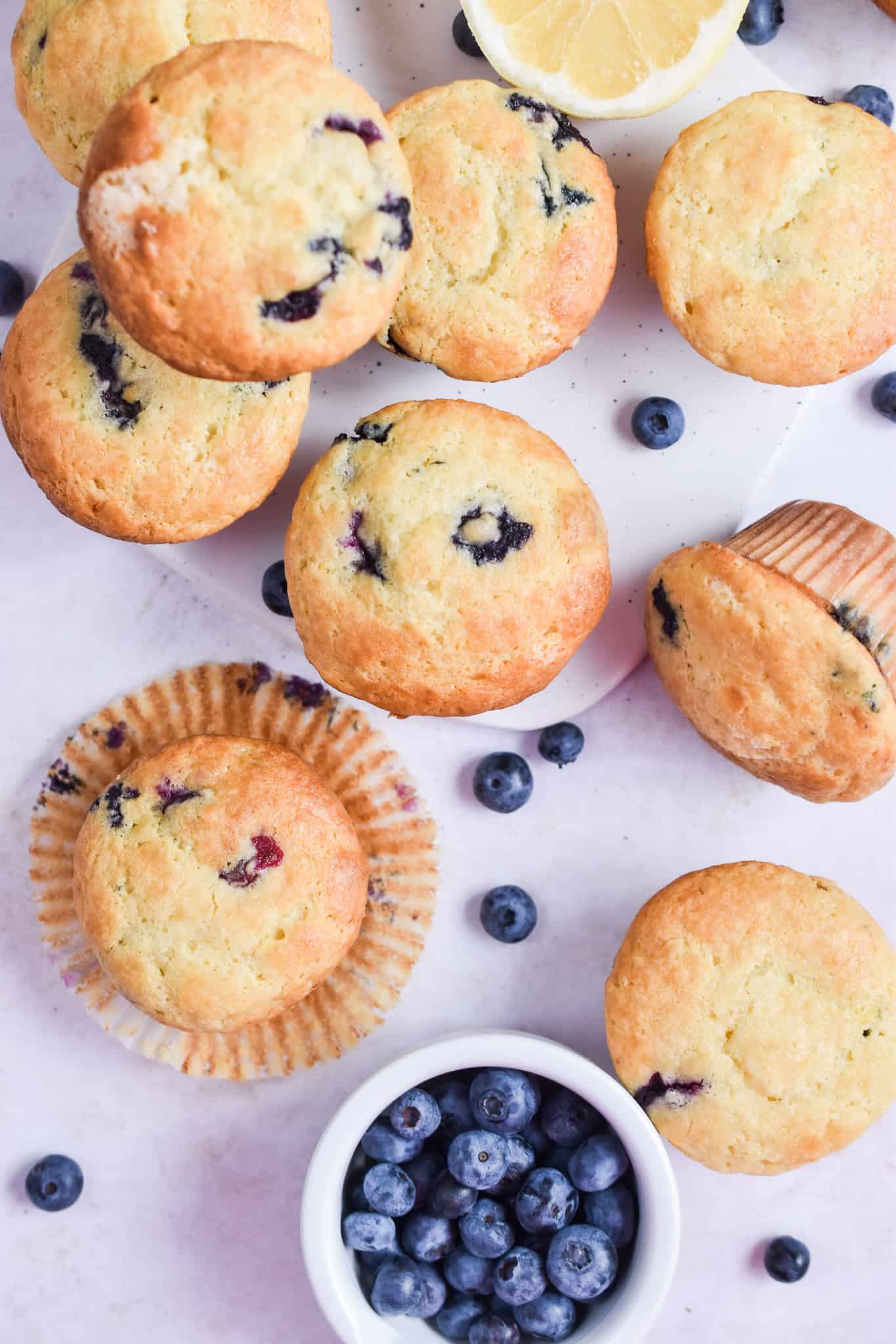 An overhead shot of the blueberry muffins with sour cream.